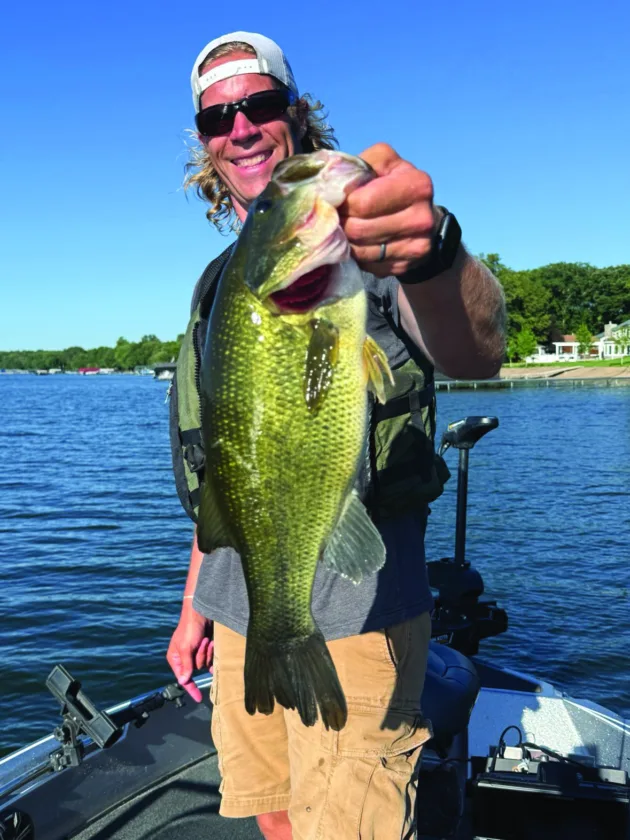 Lifting largemouth from summer docks